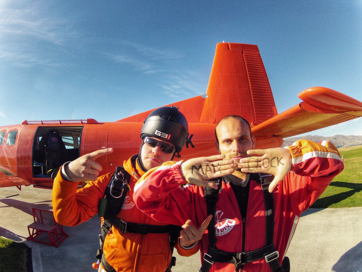 Skydiving in Wanaka Experience: My First Ever Skydive in NZ! | skydive wanaka 2 men standing outside of a skydiving plane.