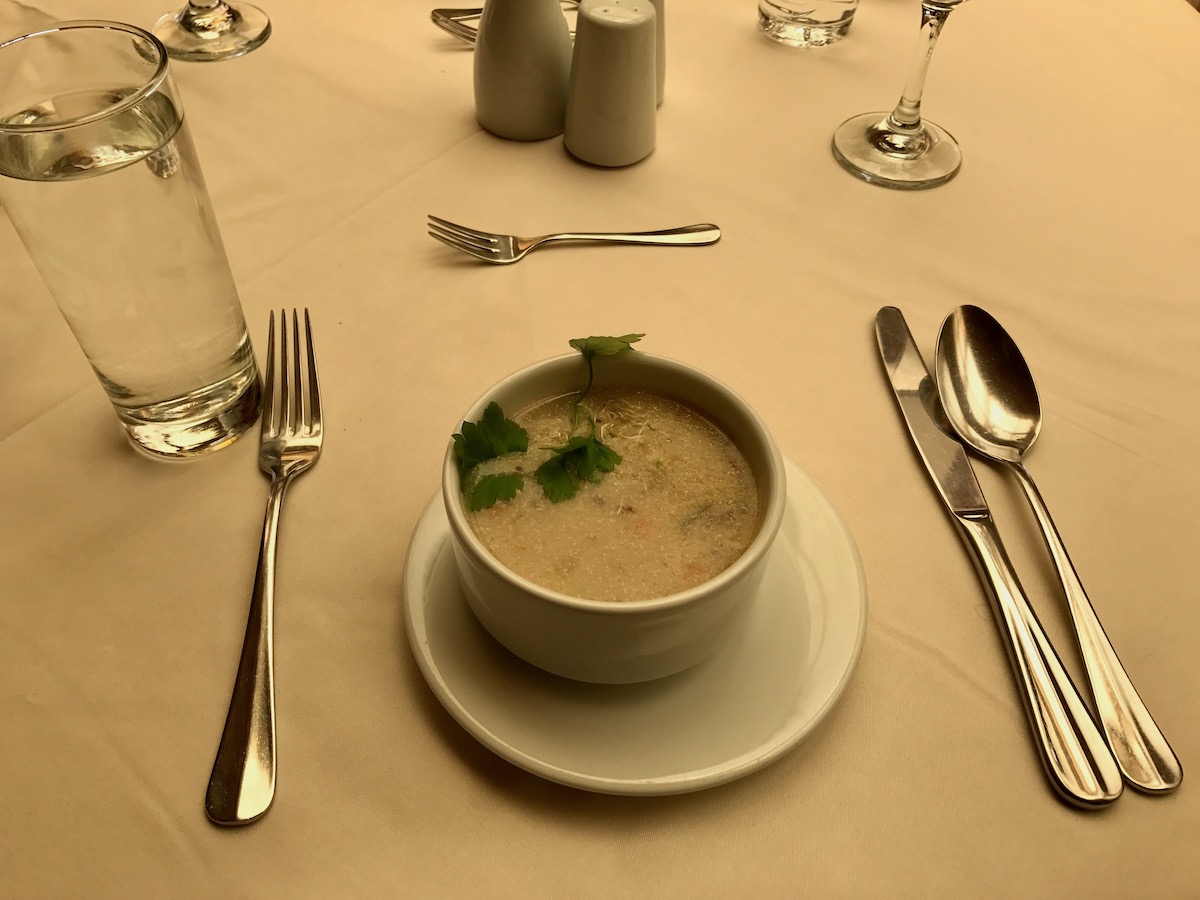 Visiting Salar de Uyuni in Bolivia: All You Need To Know | palacio de sal bolivia salt flats food Bolivian soup on a table.