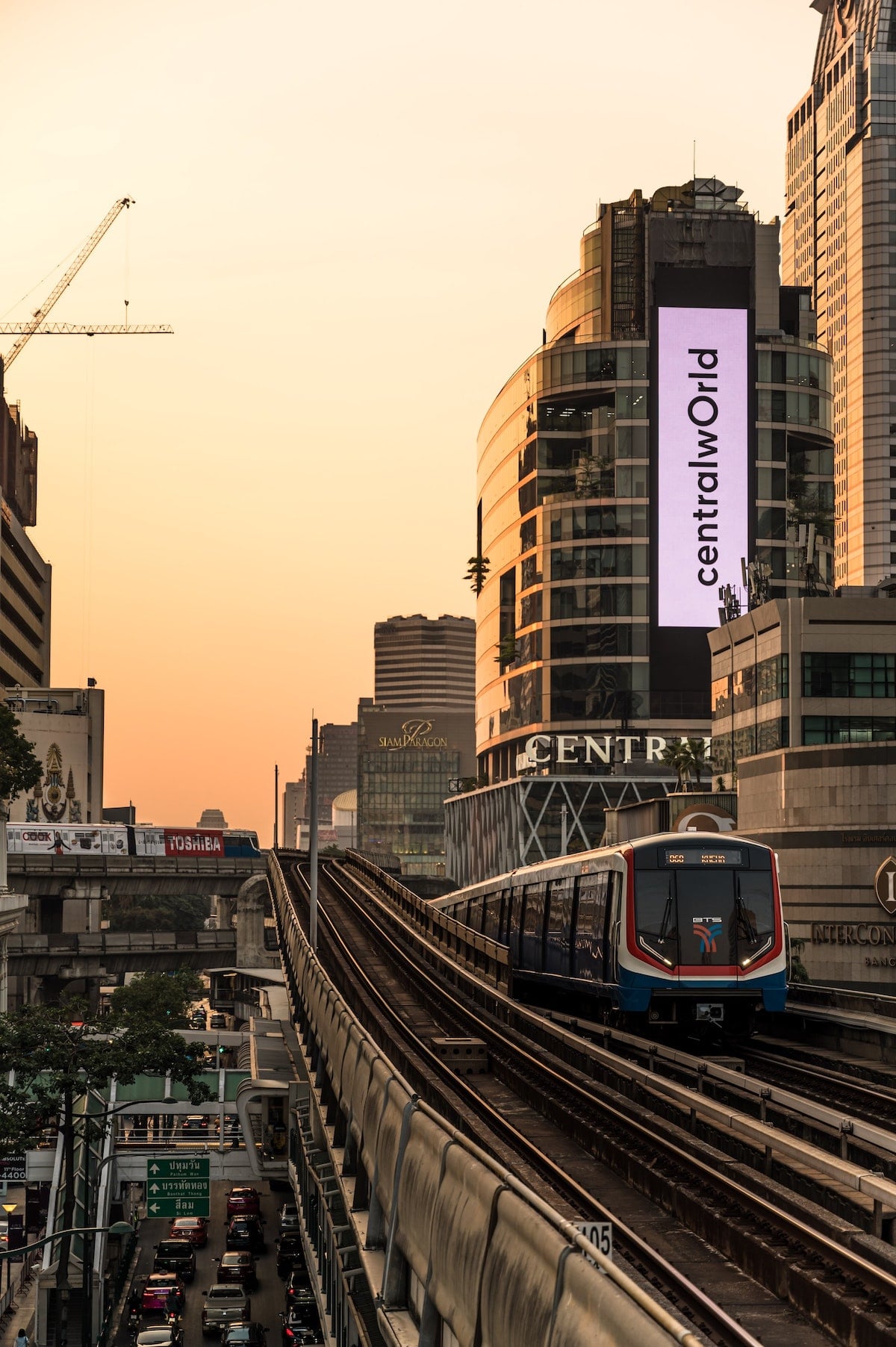 Cost of Living in Bangkok (& The Lies That Bloggers Tell) | BTS train Bangkok BTS train going past Central World in Bangkok, Thailand
