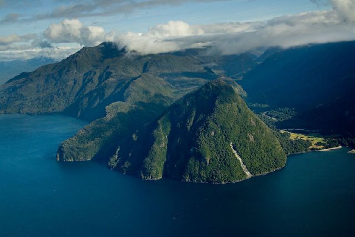 3 Weeks Patagonia Itinerary For Argentina & Chile | Pumalin National Park Lush green hills in the distance at Pumalin National Park in Chilean Patagonia
