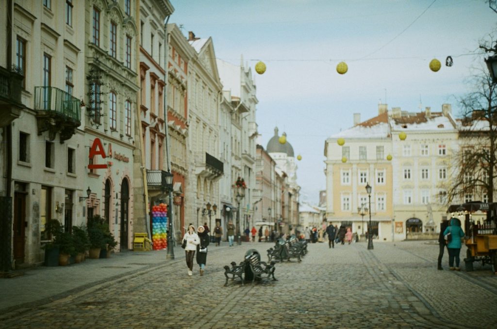 16 Cool Things To Do in Lviv, Ukraine (Morning & Night) | Rynok Square Lviv People walking in Rynok Square, Lviv, Ukraine
