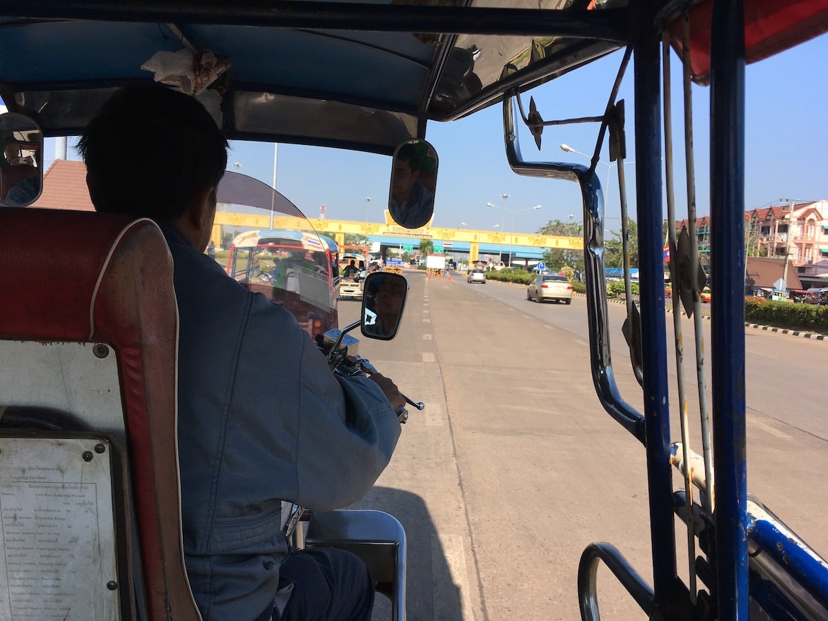 7 Things To Know Before Living in Medellin, Colombia | Thailand visa run to Laos Approaching the Laos border from a tuk tuk during an overland visa trip from Thailand