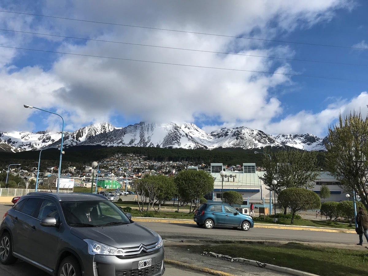 3 Weeks Patagonia Itinerary For Argentina & Chile | Ushuaia town centre Cars pass in Ushuaia Town Centre in Argentinian Patagonia