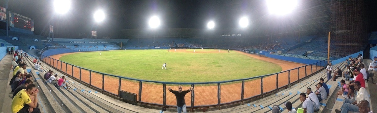 One Day in Havana Itinerary - Best Things To See & Do! | baseball game havana Male tourist at a baseball game at Estadio Latinoamericano stadium in the Cerro district of Havana