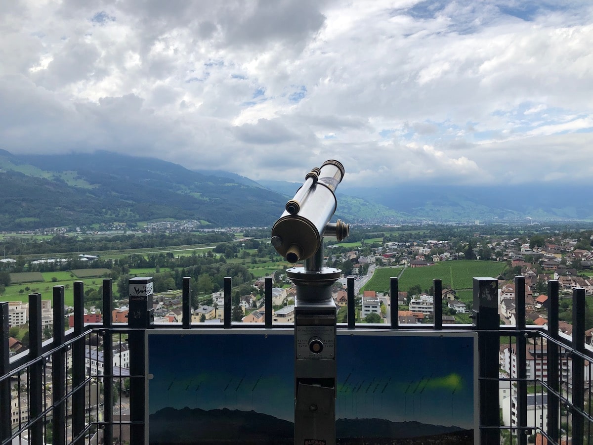 A Handy Guide To The 6 Microstates of Europe | overlooking Liechtenstein A telescope overlooking Vaduz, Liechtenstein on a clear sky day