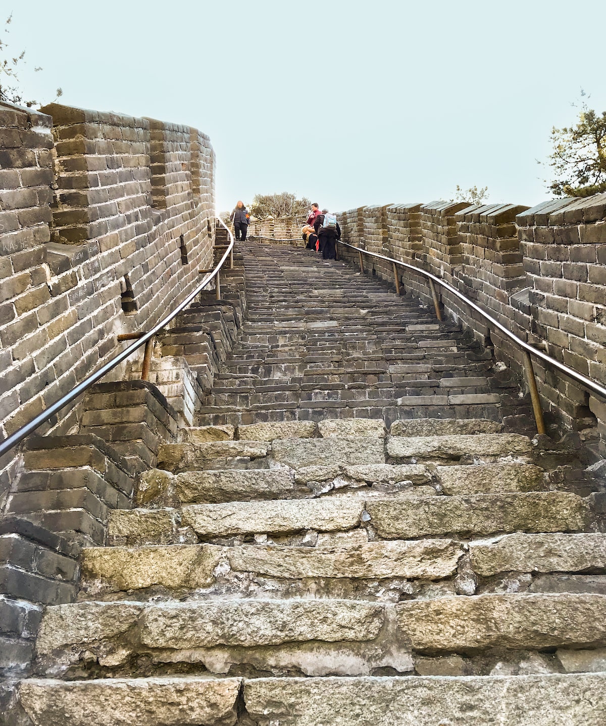 Best Place To See Great Wall of China (No Crowds, No Worries!) | Wild Great Wall steep Steep curved steps with hand railings.