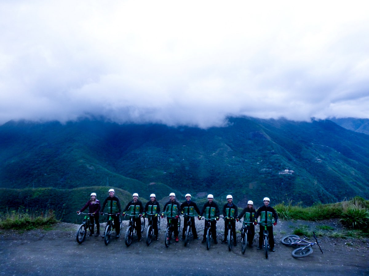 Cycling Down Bolivia's Death Road (How Not To Die!) | image 2 A tour of cyclists poses as they prepare to cycle down Bolivia's Death Road.