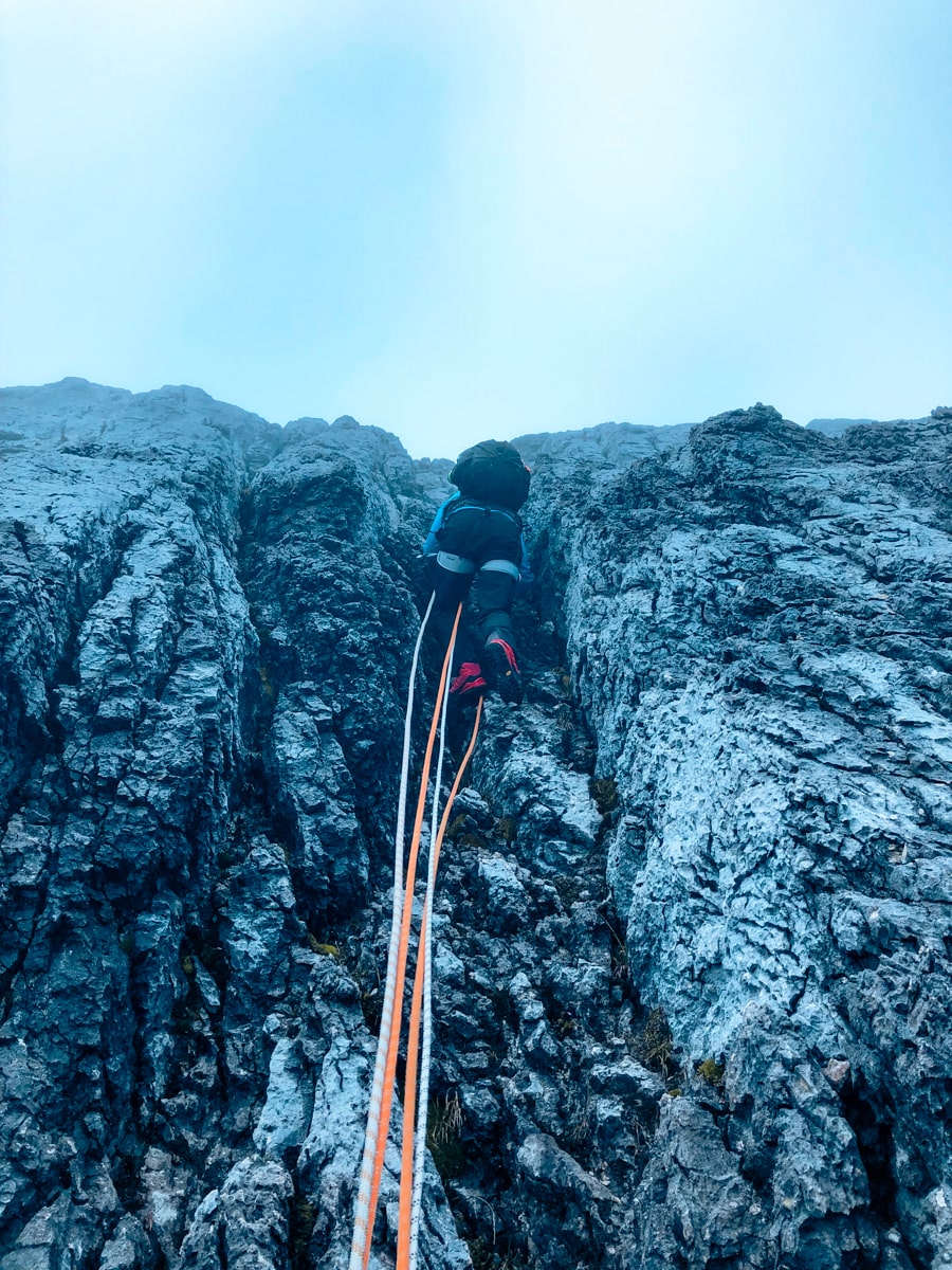 Climbing Puncak Jaya: How To Summit Carstensz Pyramid | Abseiling on Puncak Jaya Abseiling down a mountain
