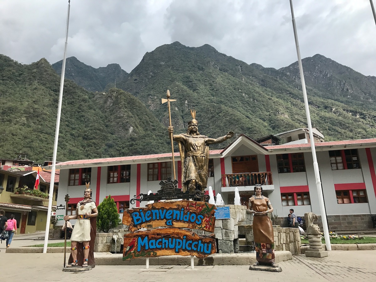 How To Get To Machu Picchu From Cusco (No Dramas, Only Llamas!) | Agua Calientes A statue of Native Incan people in Aguas Calientes, Peru