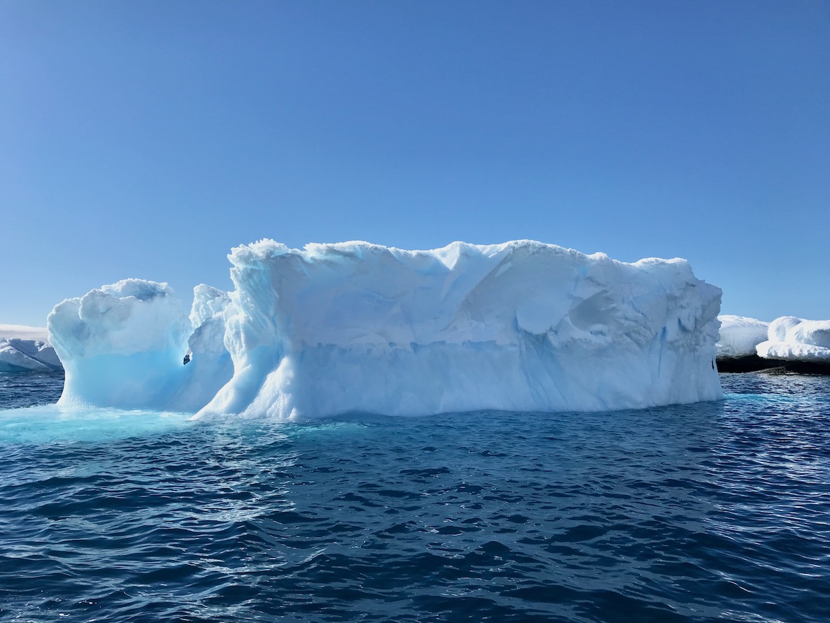 What To Expect on Your First Trip To Antarctica | Antarctica iceberg An iceberg in Antarctica during the day.