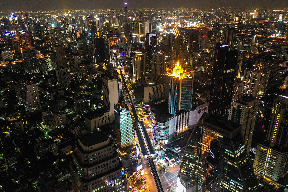 The 10 Best Neighborhoods For Expats in Bangkok | Asoke intersection Aerial view of Asoke intersection and sky train station in Bangkok Thailand. Terminal 21 mall and grande centre point, bts asoke and traffic.