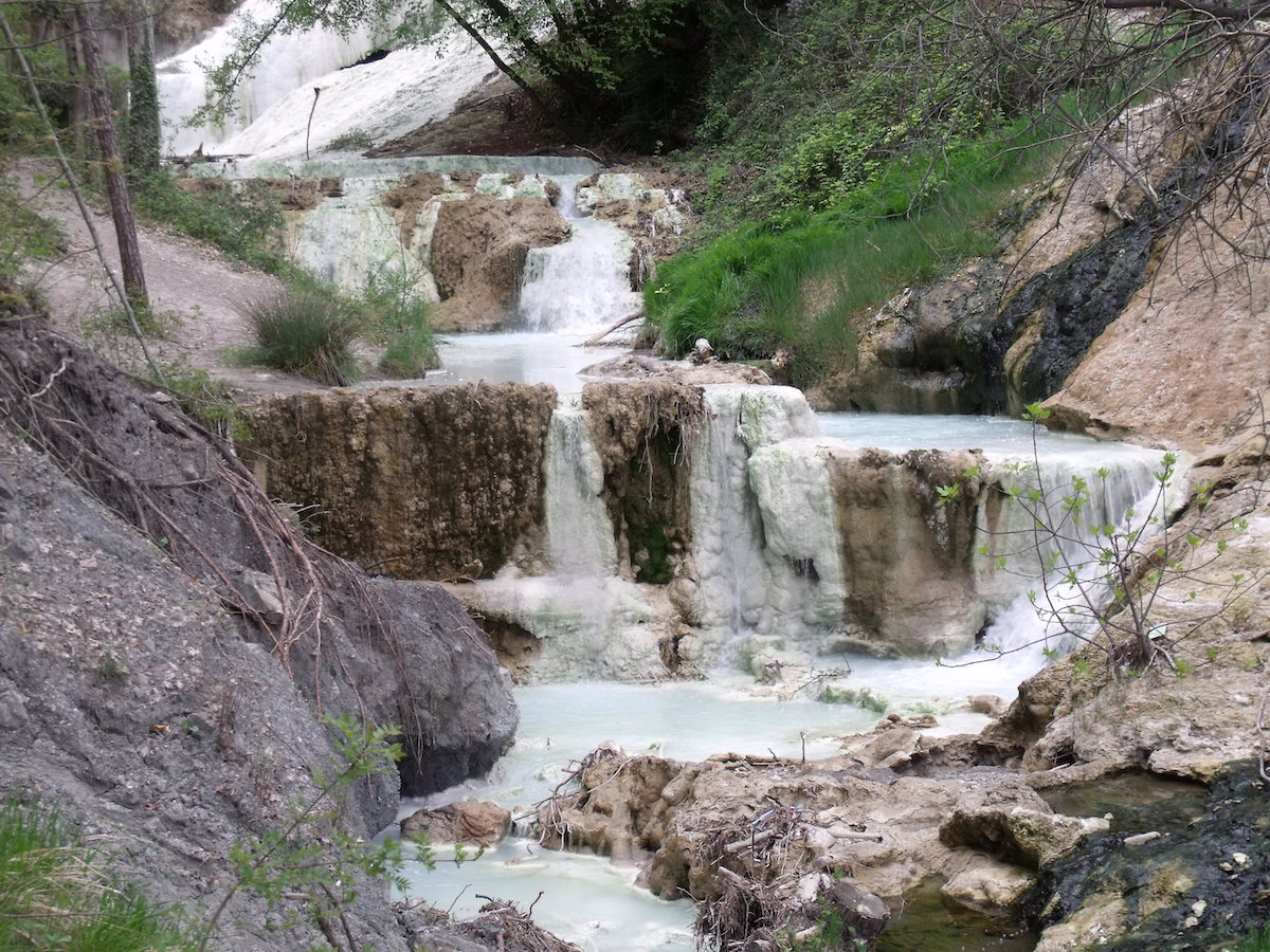 7 Natural Hot Springs in Tuscany For Wellness Lovers | Bagni San Filippo hot springs Tuscany Bagni San Filippo hot springs in Tuscany