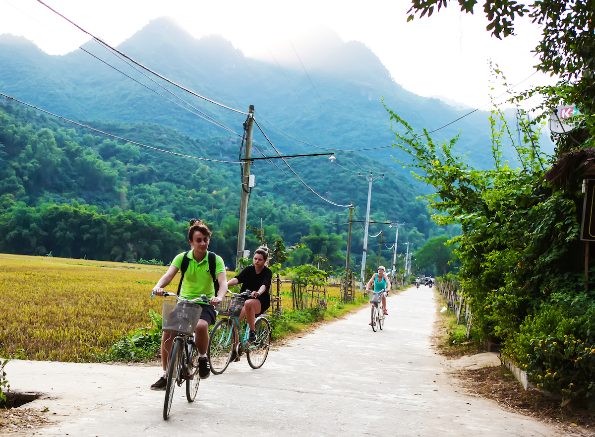 15 Things To Do in Vientiane, Laos (Includes Day Trips) | Ban Mai Tourists driving just outside Vientiane during the day