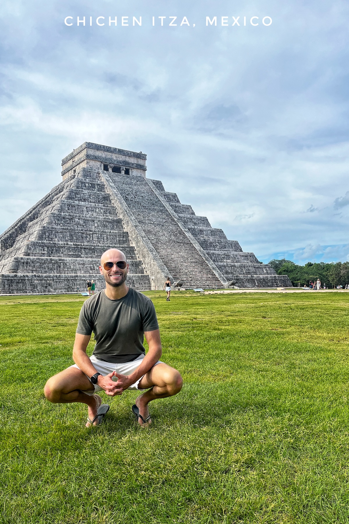 Ranking The New Seven Wonders Of The World From Worst To Best | Chichen Itza Mexico wonder Male tourist poses in front of Chichen itza of Mexico,