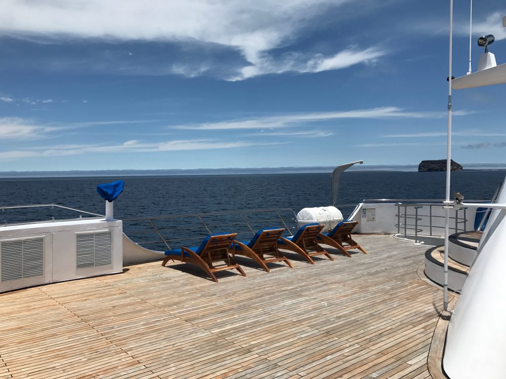 5 Days in The Galapagos Islands Itinerary (On a Cruise) | Cruise Ship deck Galapagos Islands Deck chairs overlooking the sea in the Galapagos Islands.