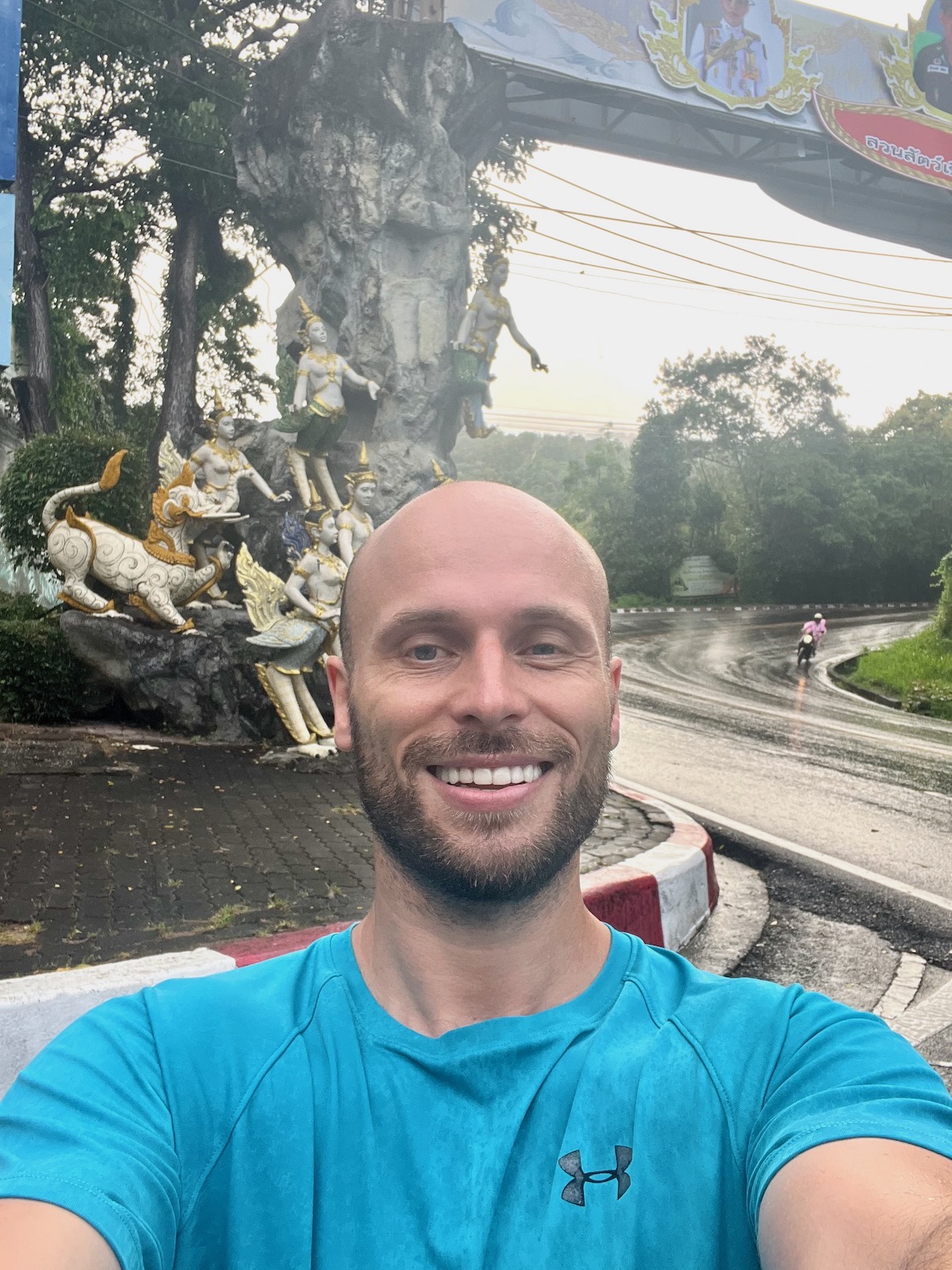 Detailed Chiang Mai Digital Nomad Guide For 2024 | Doi Suthep half marathon 1 Elated (and tired) smiles after my first sub-2 hours of the Doi Suthep hill half marathon