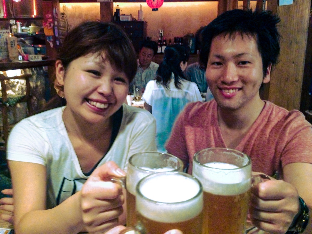 Tokyo or Kyoto: Which City Should You Visit? | Drinking beer with locals in Tokyo Japanese locals drinking
