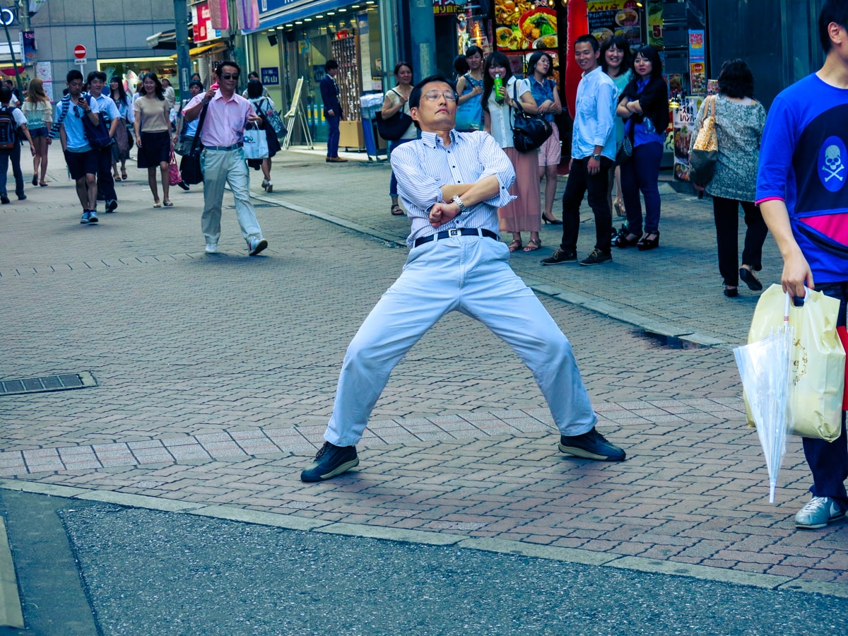 Tokyo or Kyoto: Which City Should You Visit? | Funny man Tokyo A weird Japanese man pulls a pose in the streets of Tokyo