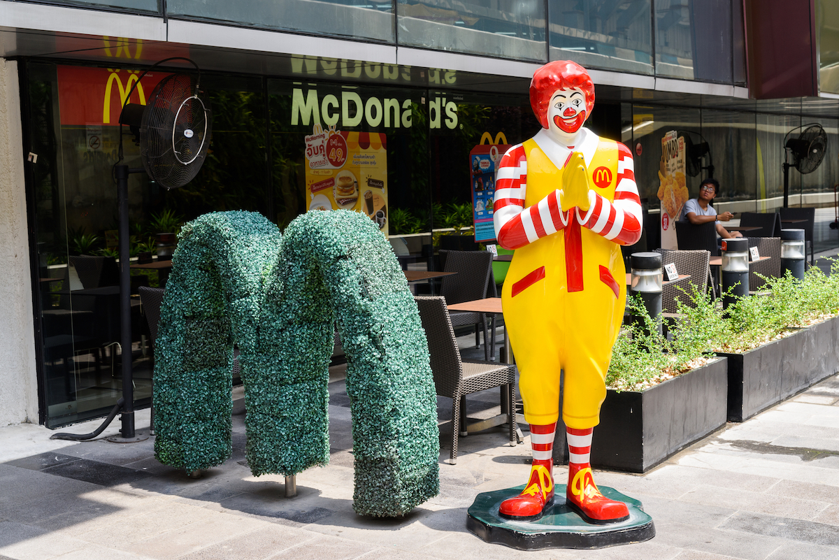 The 10 Best Neighborhoods For Expats in Bangkok | Ladprao Ronald McDonald making the traditional Thai 'wai' greeting stands outside a McDonald's company outside of Central Ladprao shopping mall
