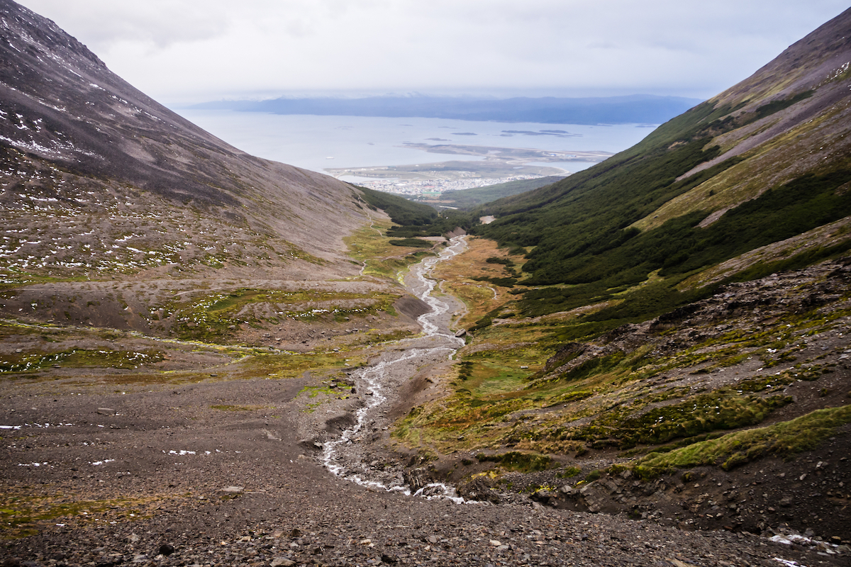23 Best Things To Do in Ushuaia, Argentina | Martial Glacier Valley of the Martial glacier and the river with Ushuaia and the Beagle channel in the back