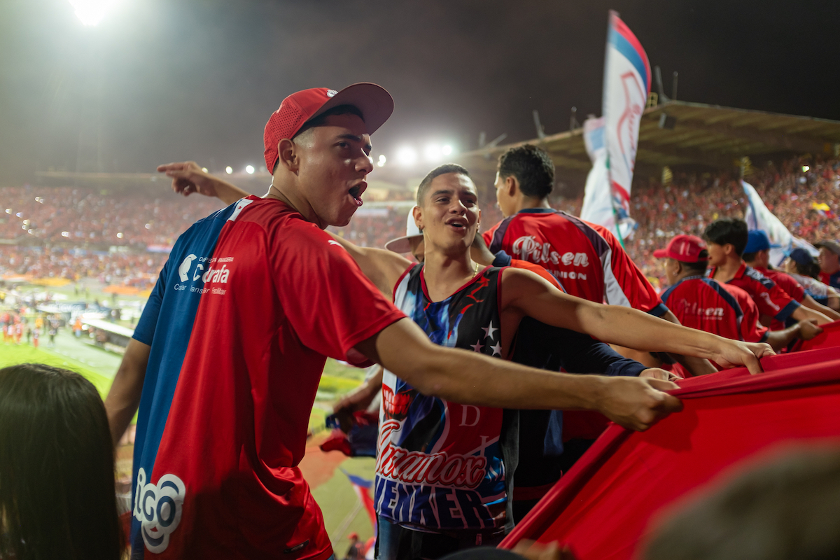 Expat's Guide To The Top Things To Do in Medellin, Colombia | Medellin Football Match People Cheering at Football Cup Final Game at Night in Medellin