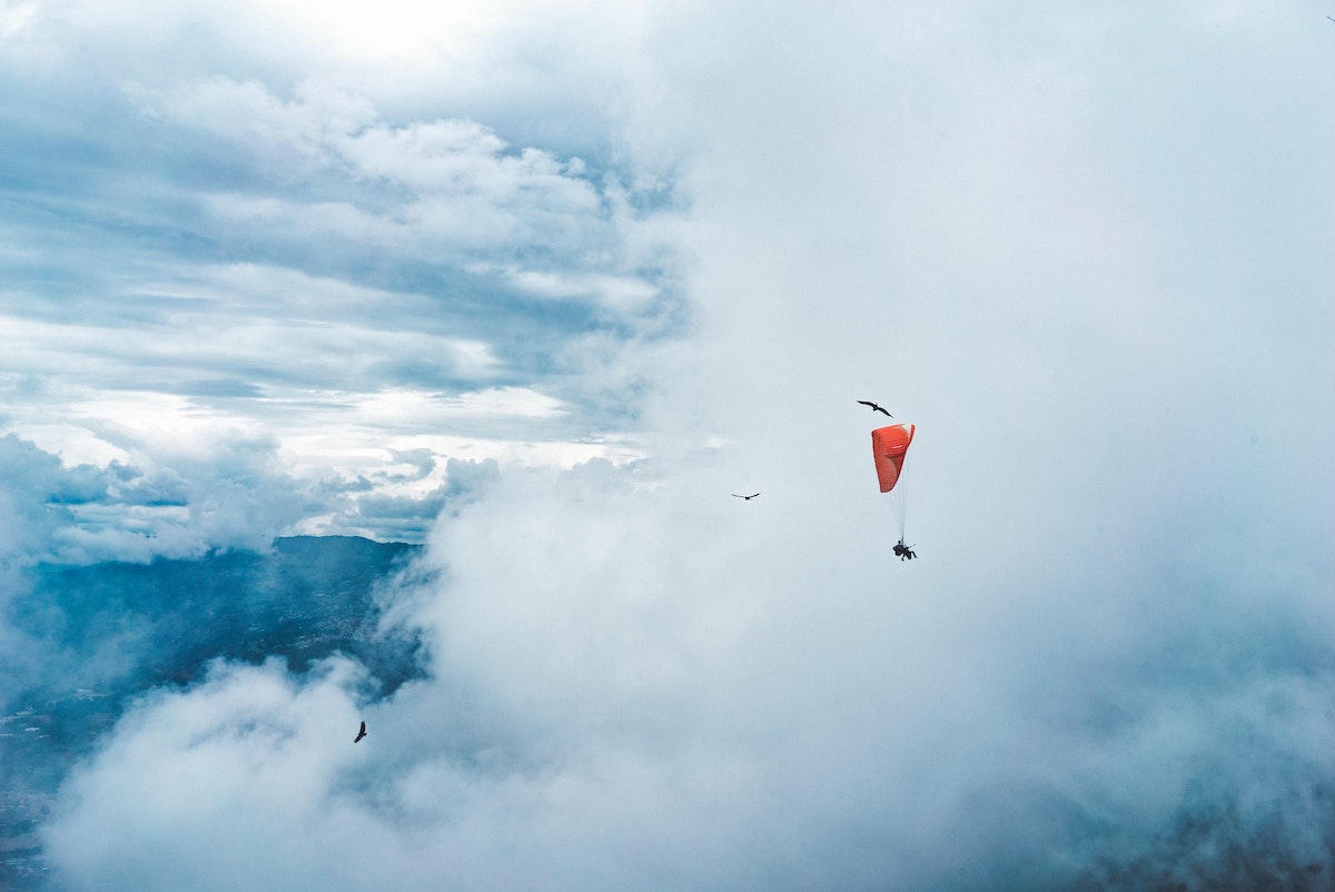 Expat's Guide To The Top Things To Do in Medellin, Colombia | Paragliding in Medellin Paragliding in the clouds