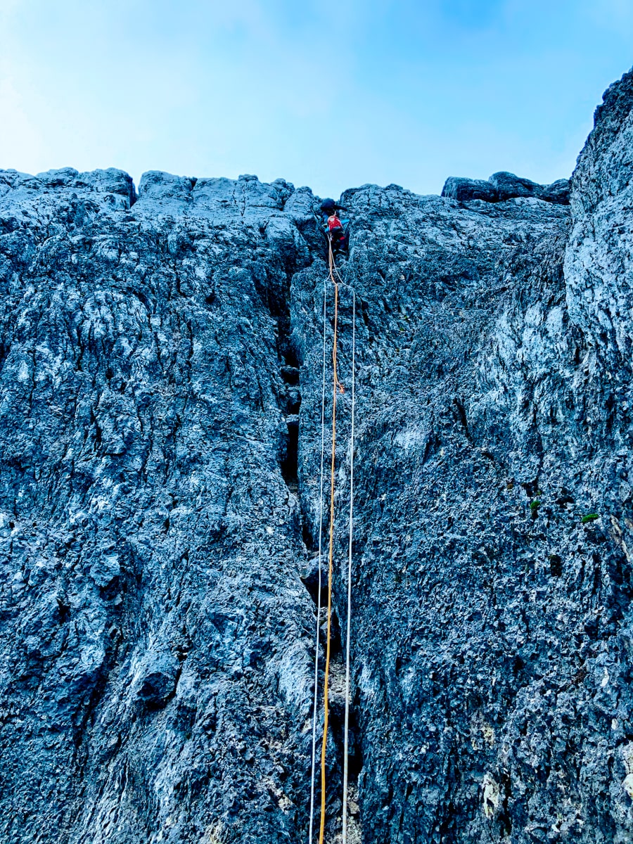 Climbing Puncak Jaya: How To Summit Carstensz Pyramid | Puncak Jaya abseiling A climber abseiling up Puncak Jaya