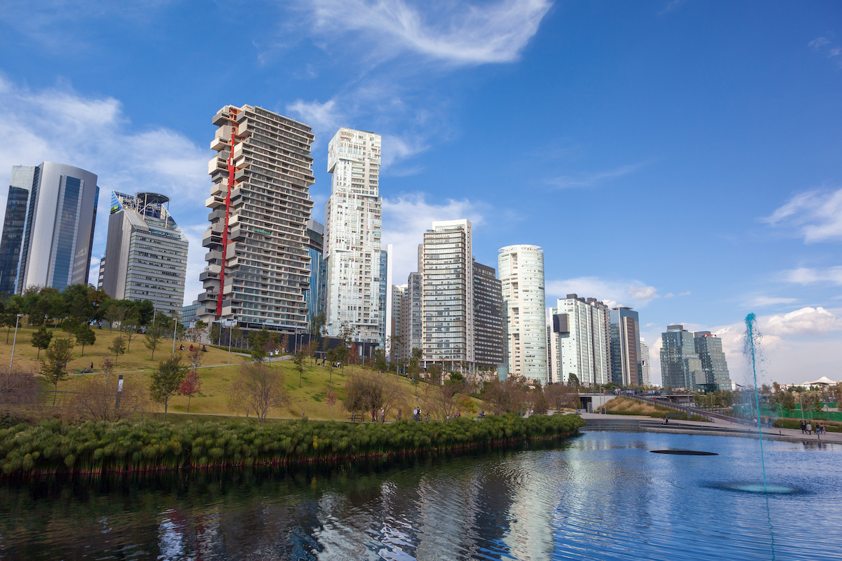Detailed Digital Nomad Mexico City Guide For 2024 | Santa Fe Mexico City La Mexicana Park with modern and beautiful skyscrapers on Santa Fe, Mexico City's major business districts.