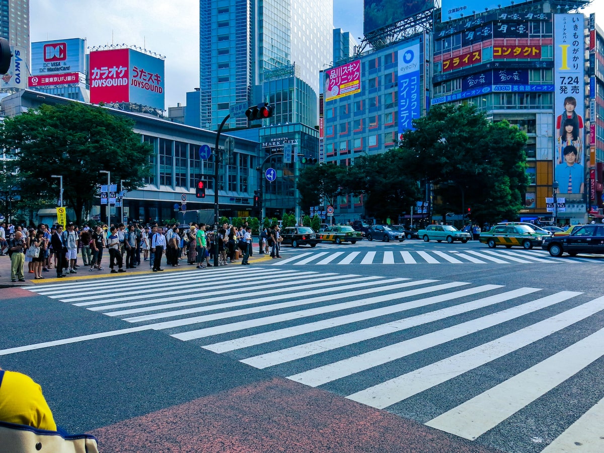 Tokyo or Kyoto: Which City Should You Visit? | Shibuya Crossing Tokyo People waiting at Shibuya Crossing in Tokyo, Japan
