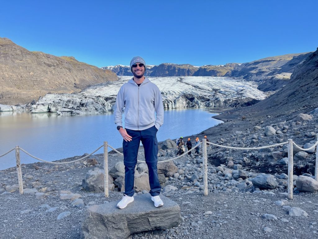 Is Iceland Worth Visiting or Overhyped? Honest Verdict After 150 Countries | Solheimajokull Glacier Man Overlooking Sólheimajökull Glacier near Vík