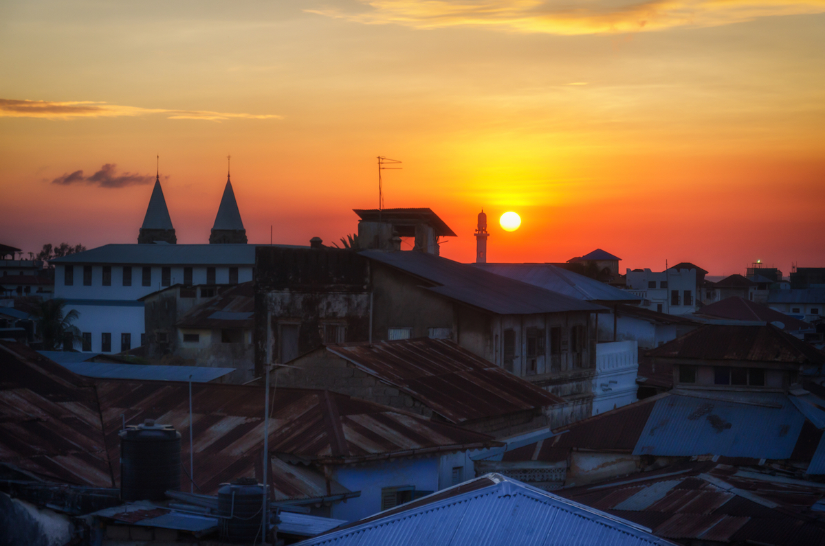 The 6 Best Sunset Spots in Zanzibar | Stone Town sunset The sun sets on our first night in Zanzibar, as viewed from the rooftop restaurant at the Emerson Spice Hotel.
