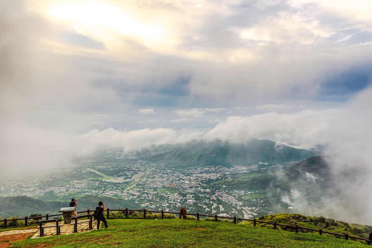 The Ultimate Hong Kong Bucket List: 25 Best Things To Do! | Tai Mo Shan The Observation Deck from Tai Mo Shan, Hong Kong overlooking the city and mountains