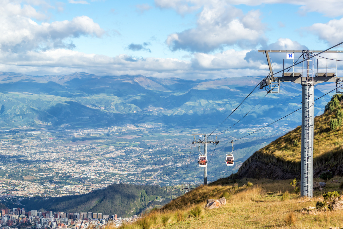 One Week in Quito, Ecuador: 23 Things in 7 Days! | Teleferico quito View of a gondola named the TeleferiQo climbing the Andes mountains outside of Quito, Ecuador