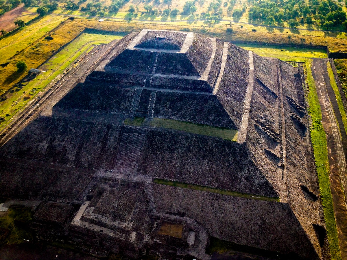 16 Famous Landmarks in Mexico (& How To See Them in 2024!) | Teotihuacan pyramids from above View of a pyramid from above.