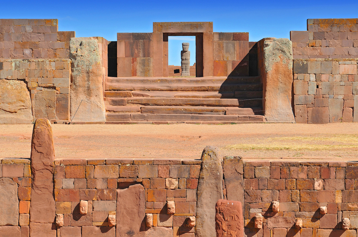 28 Best Things To Do in La Paz, Bolivia & Surrounding Areas | Tiwanaku Stone ruins featuring a life sized stone human, or maybe even a God from the times that it was built.