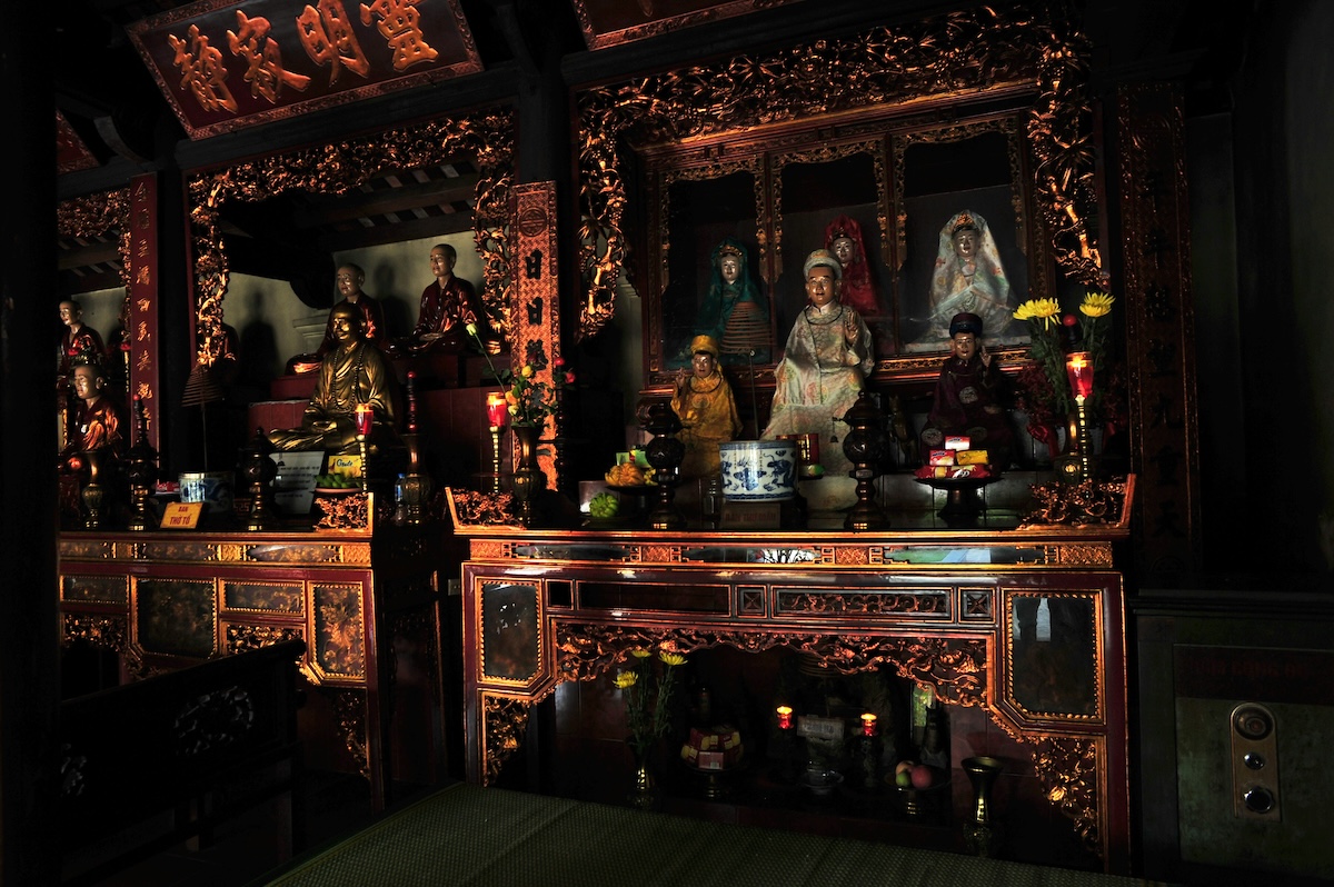 One Day in Hanoi Itinerary: No Transport Needed (Walking Only!) | Tran Quoc Pagoda Buddhist artefacts in a temple, Hanoi, Vietnam
