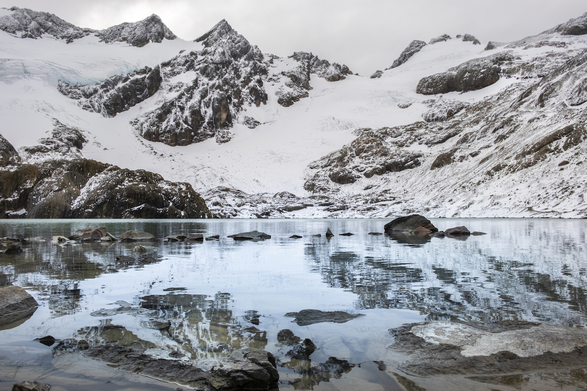 23 Best Things To Do in Ushuaia, Argentina | Vinciguerra Glacier A beautiful lagoon where the Vinciguerra glacier is reflected with its snowy mountains