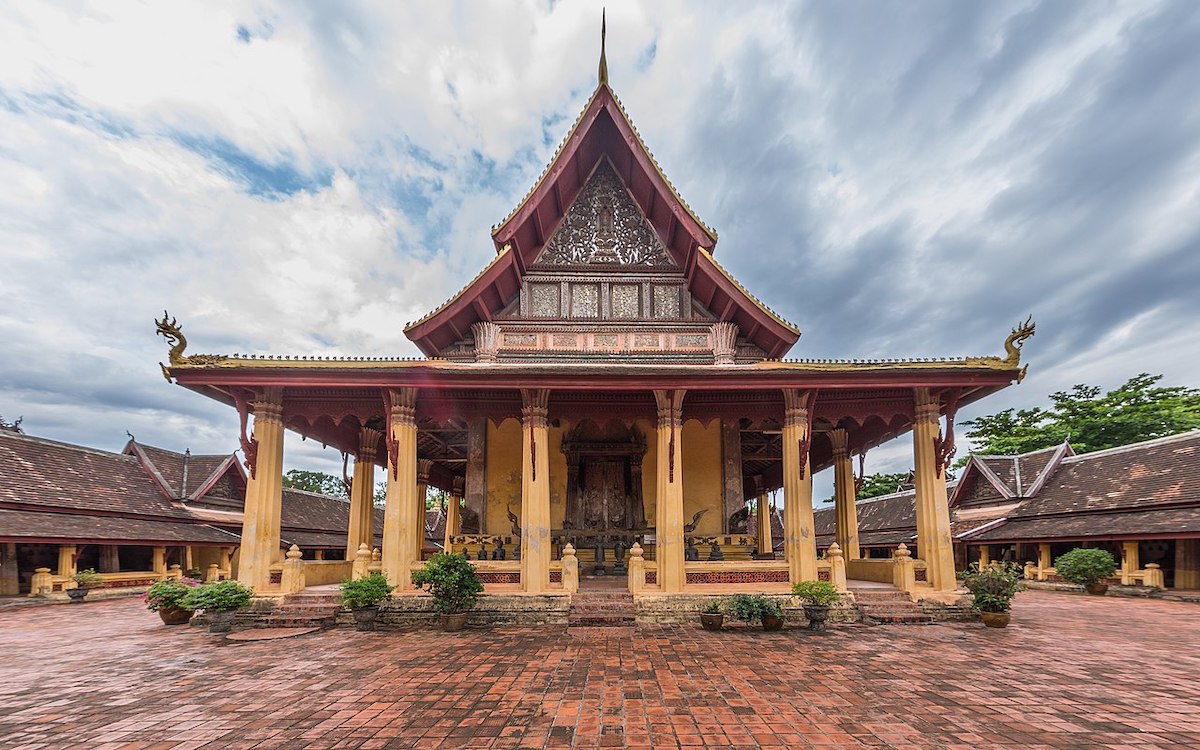 15 Things To Do in Vientiane, Laos (Includes Day Trips) | Wat Si Saket Laos Wat Si Saket of Vientiane in its paved courtyard, under a stormy sky, in Vientiane, Laos