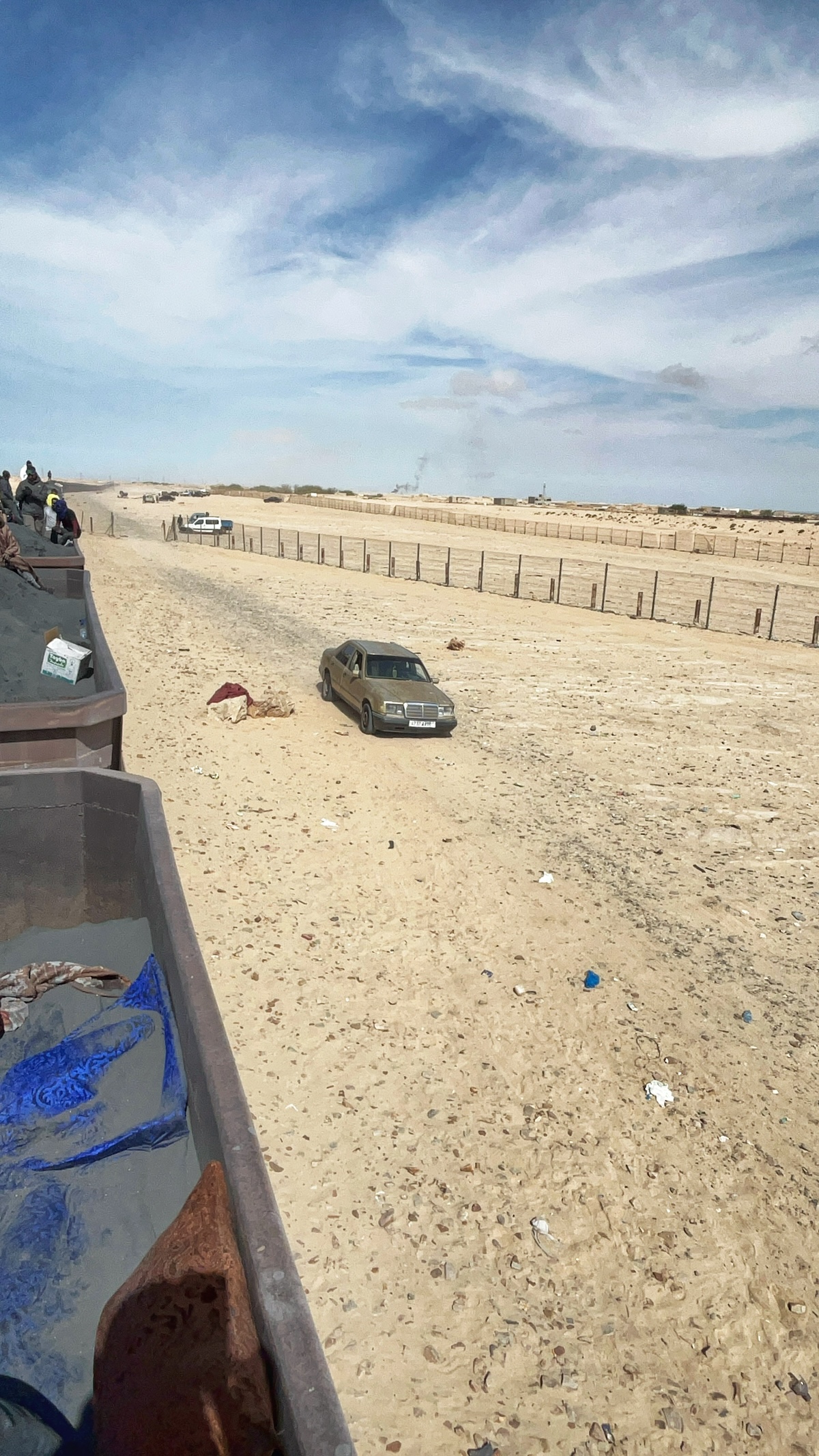 Riding The Iron Ore Train, Mauritania: My Sahara Experience! | arriving in Nouadhibou Iron ore train arriving in Nouadhibou