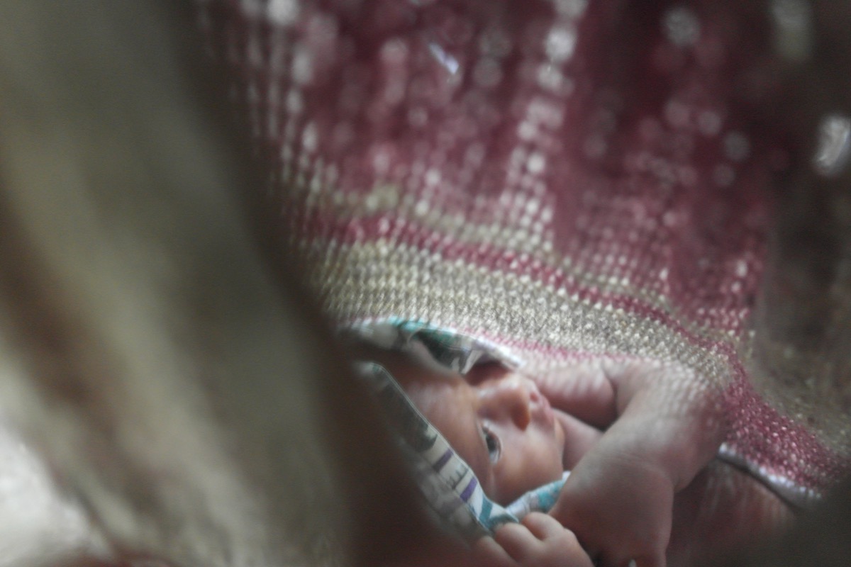 The Tribespeople of Papua New Guinea: A Detailed Guide | baby papua new guinea tribe 1 1 A baby waking up after a nap