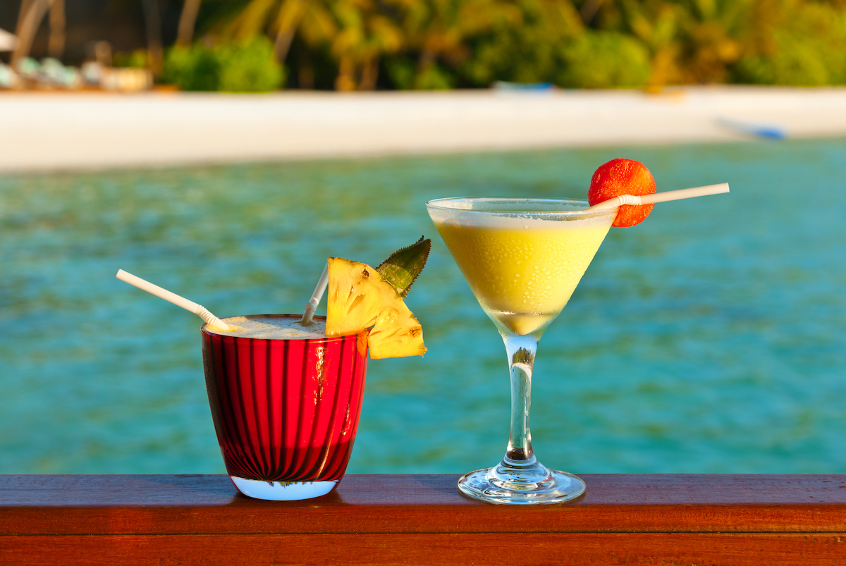 How To Plan a Trip To The Maldives | cocktails in Maldives Fruit cocktail on Maldives beach