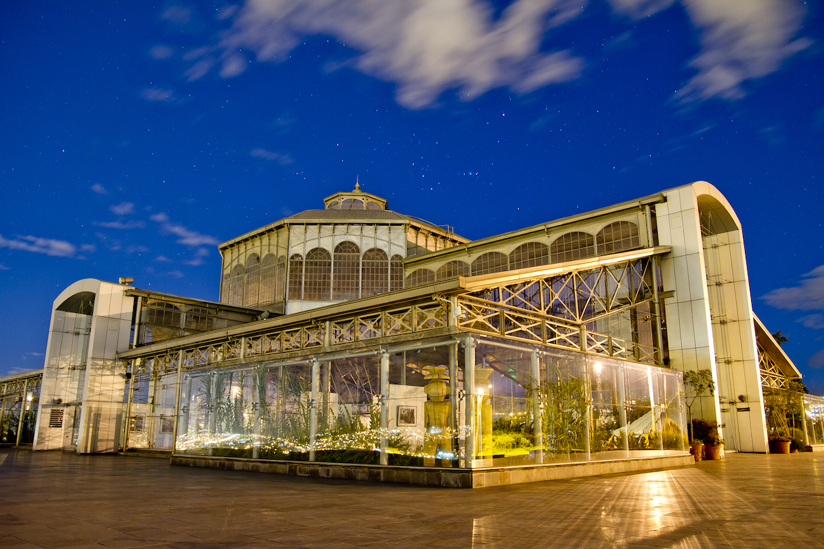 One Week in Quito, Ecuador: 23 Things in 7 Days! | crystal palace quito A large clear glass building lit up at night in Quito, Ecuador.