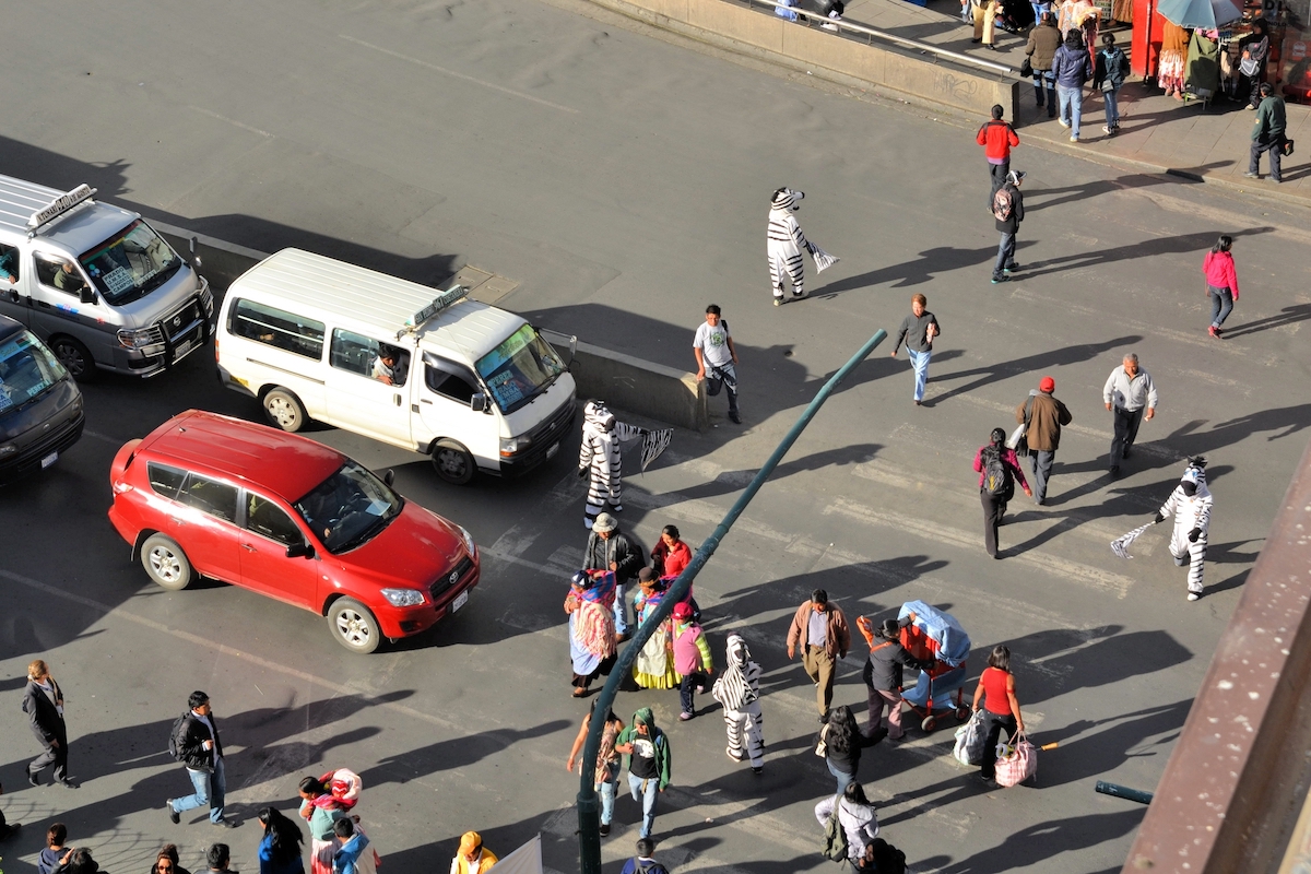 28 Best Things To Do in La Paz, Bolivia & Surrounding Areas | dancing zebras la paz Workers dressed as Zebras teach citizens the right way to cross the street using a Zebra styled crosswalk in La Paz, the de facto capital city of Bolivia