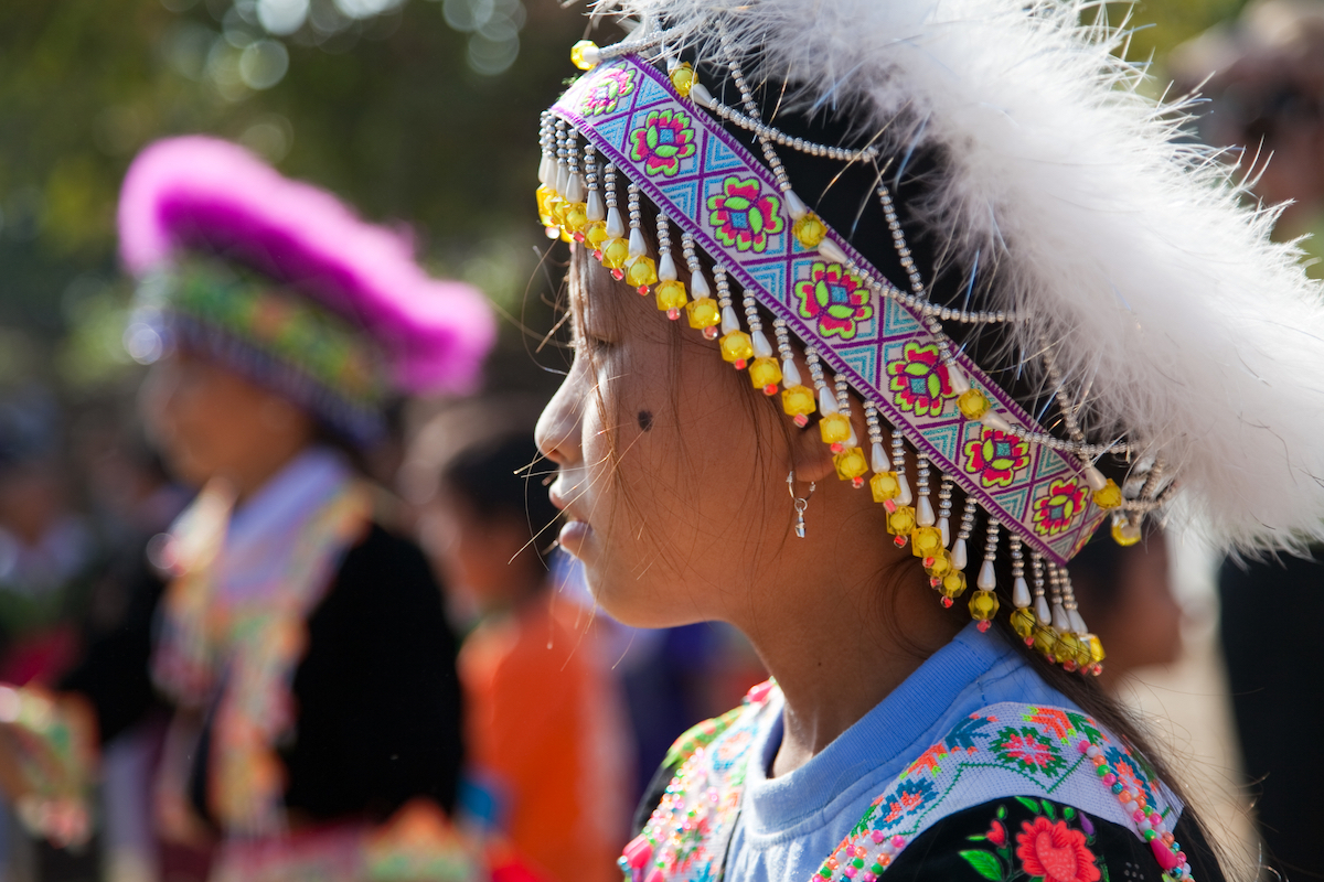 17 Best Thailand Festivals (That You May Never Heard Of) | hmong child in thailand Hmong children celebrate the Hmong New Year, a famous Thailand festival that takes place every year.