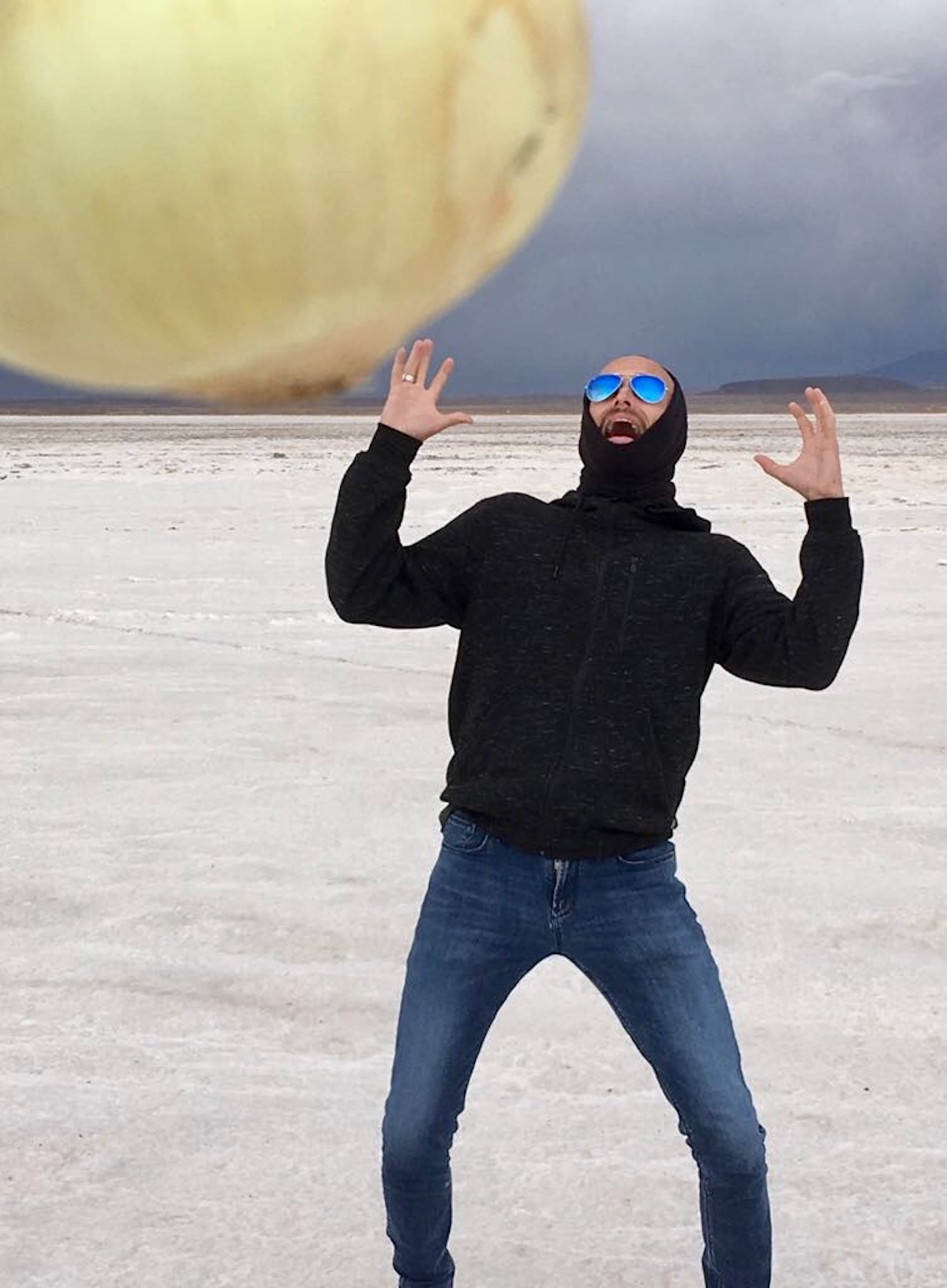 Visiting Salar de Uyuni in Bolivia: All You Need To Know | image 6 A man scared of a giant onion in Salar de Uyuni.