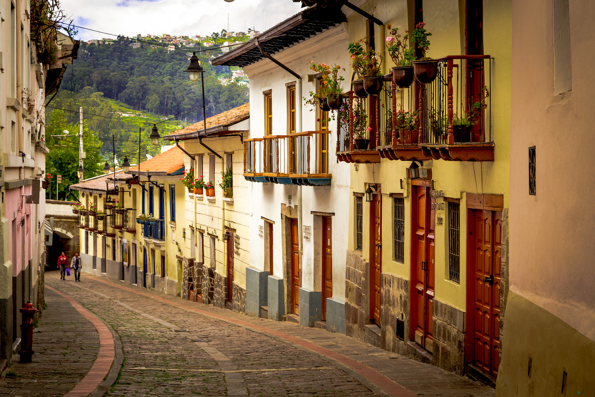 One Week in Quito, Ecuador: 23 Things in 7 Days! | la ronda quito A cobble-stoned street with yellow buildings in Quito, Ecuador.