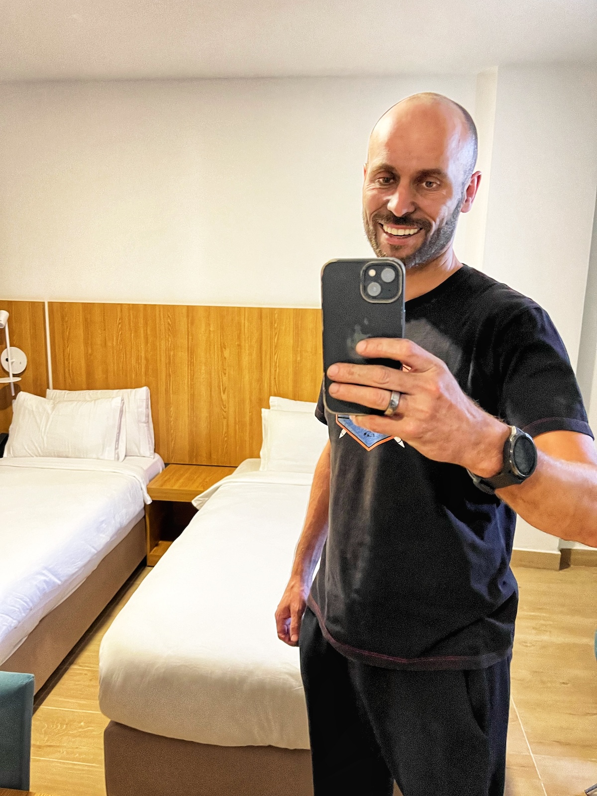 Riding The Iron Ore Train, Mauritania: My Sahara Experience! | mess after Mauritania train Man poses with dirty face in hotel room