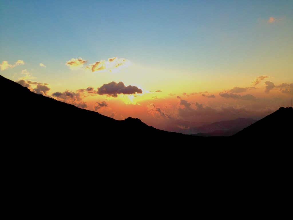 Pacaya Volcano Sunset Hike: An Honest Guide For 2024 | summit pacaya volcano sunset Red sky sunset over mountains in Guatemala.