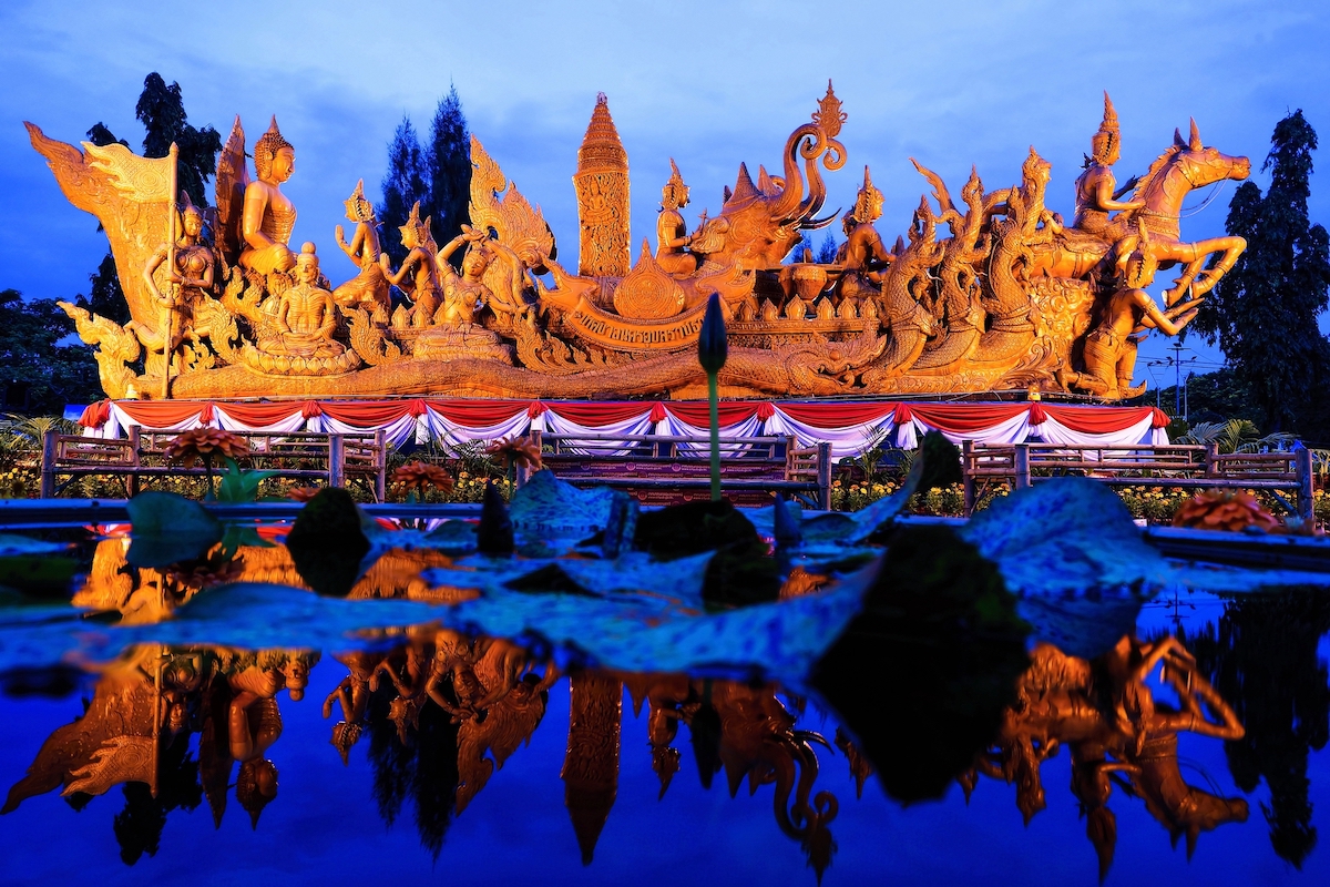 17 Best Thailand Festivals (That You May Never Heard Of) | thai candle procession festival A beautiful large golden sculpture made of wax is on display at the Ubon Ratchathani Candle Festival in Thailand.