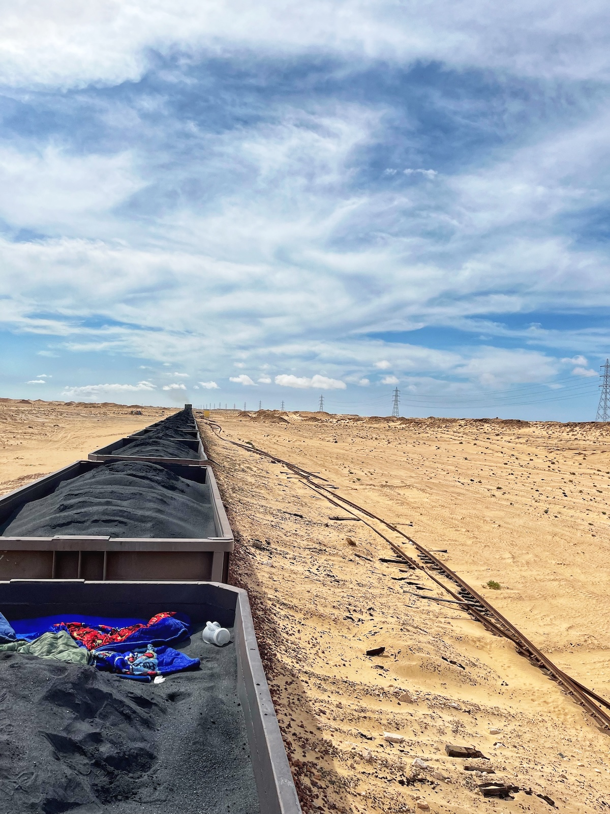 Riding The Iron Ore Train, Mauritania: My Sahara Experience! | views from iron ore Mauritania A long train carrying iron ore rides over the desert